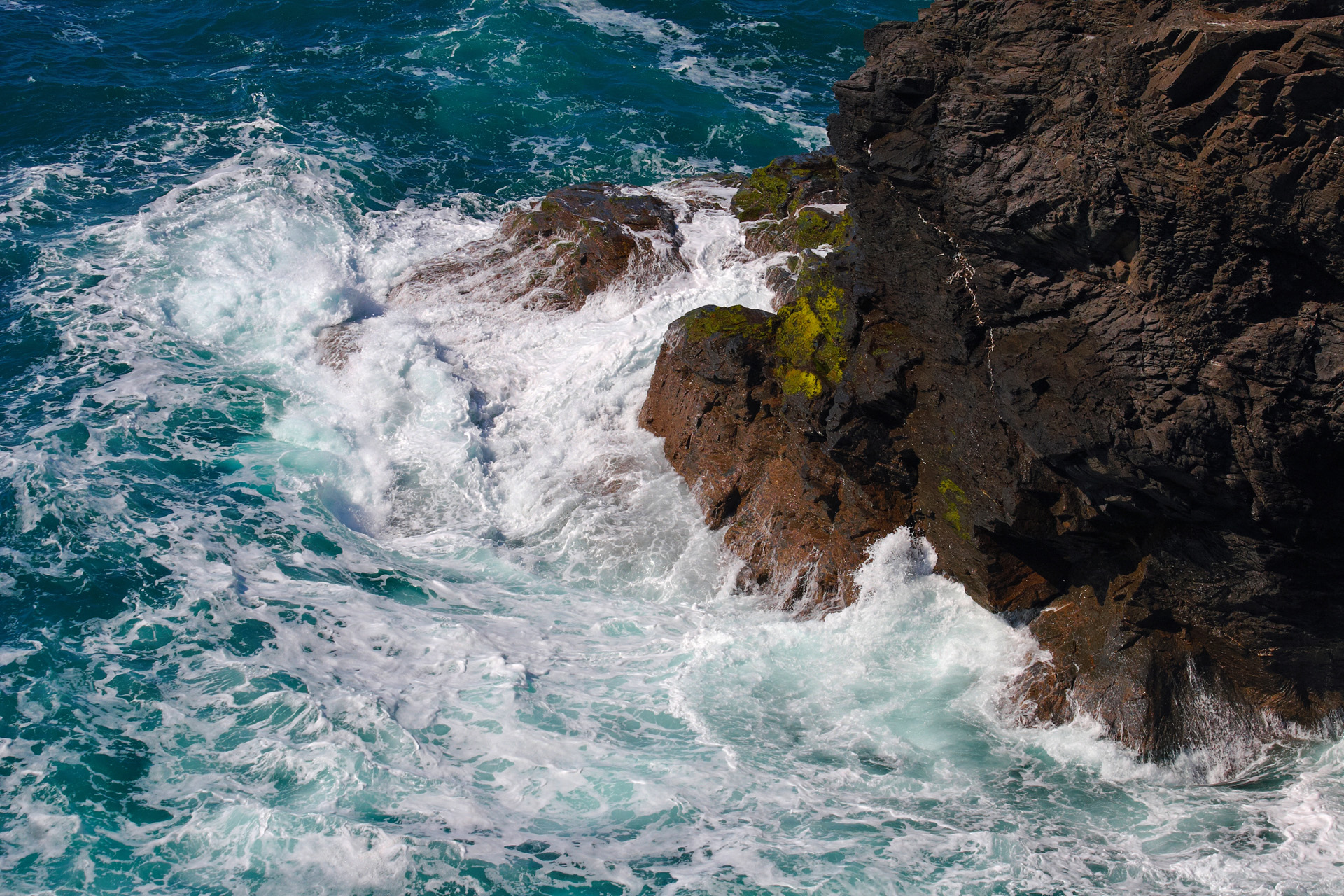 Waves breaking on the rocks at High Cove, Cornwall