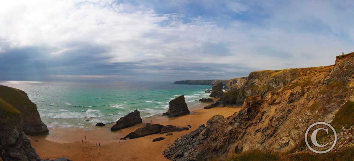 Bedruthan Steps pano from the cliff top, with a storm brewing at sea ...