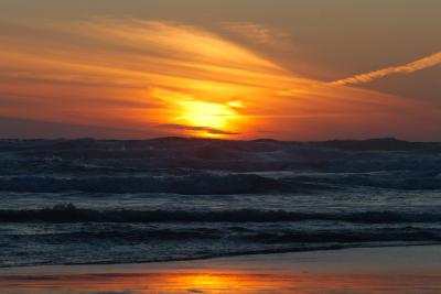 Sunset on the beach at Bedruthan Steps in Cornwall