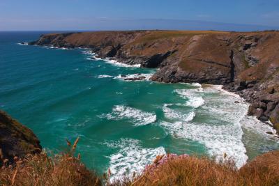 Waves breaking on the beach at Pentire Steps, Cornwall