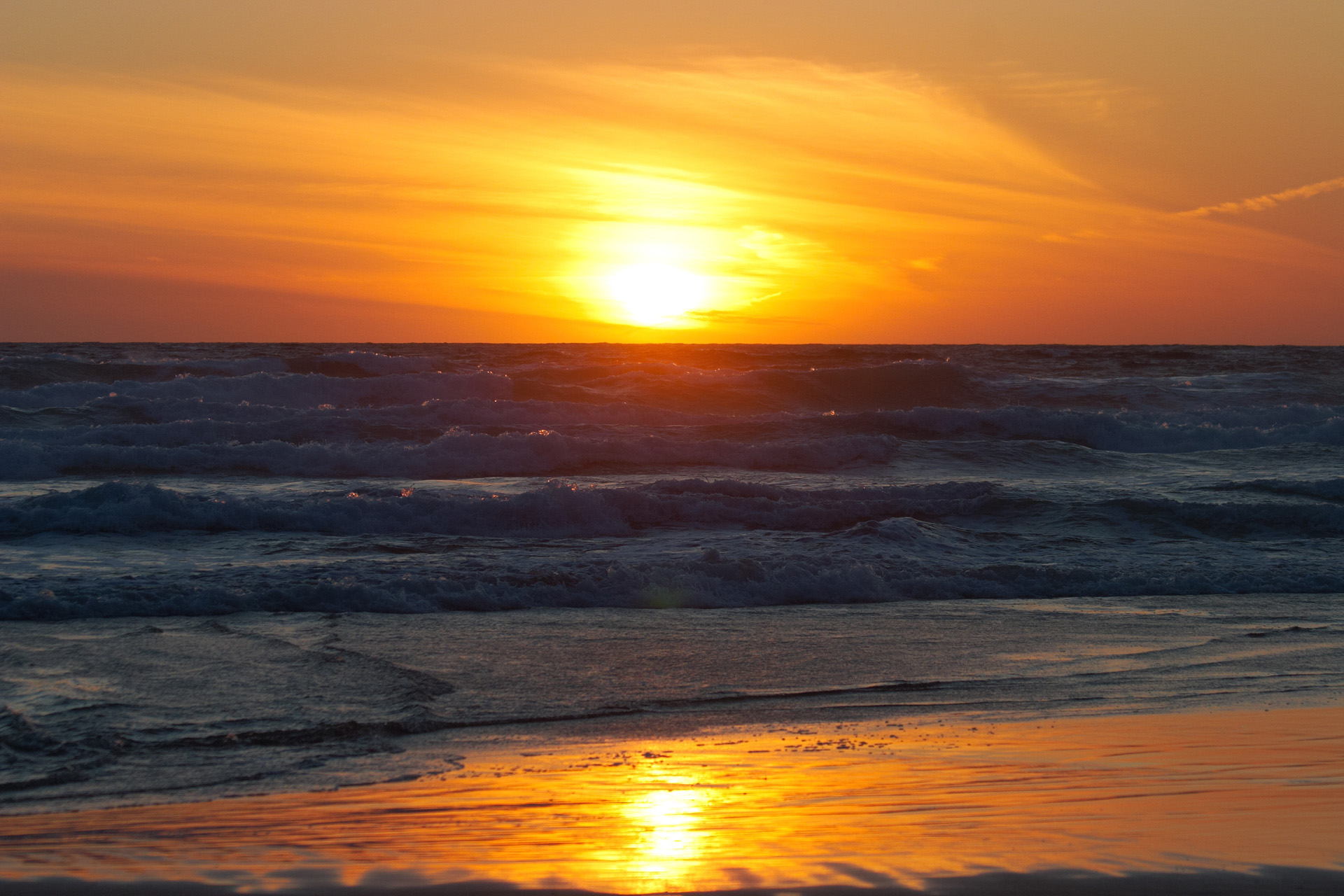 Sunset on the beach at Bedruthan Steps in Cornwall