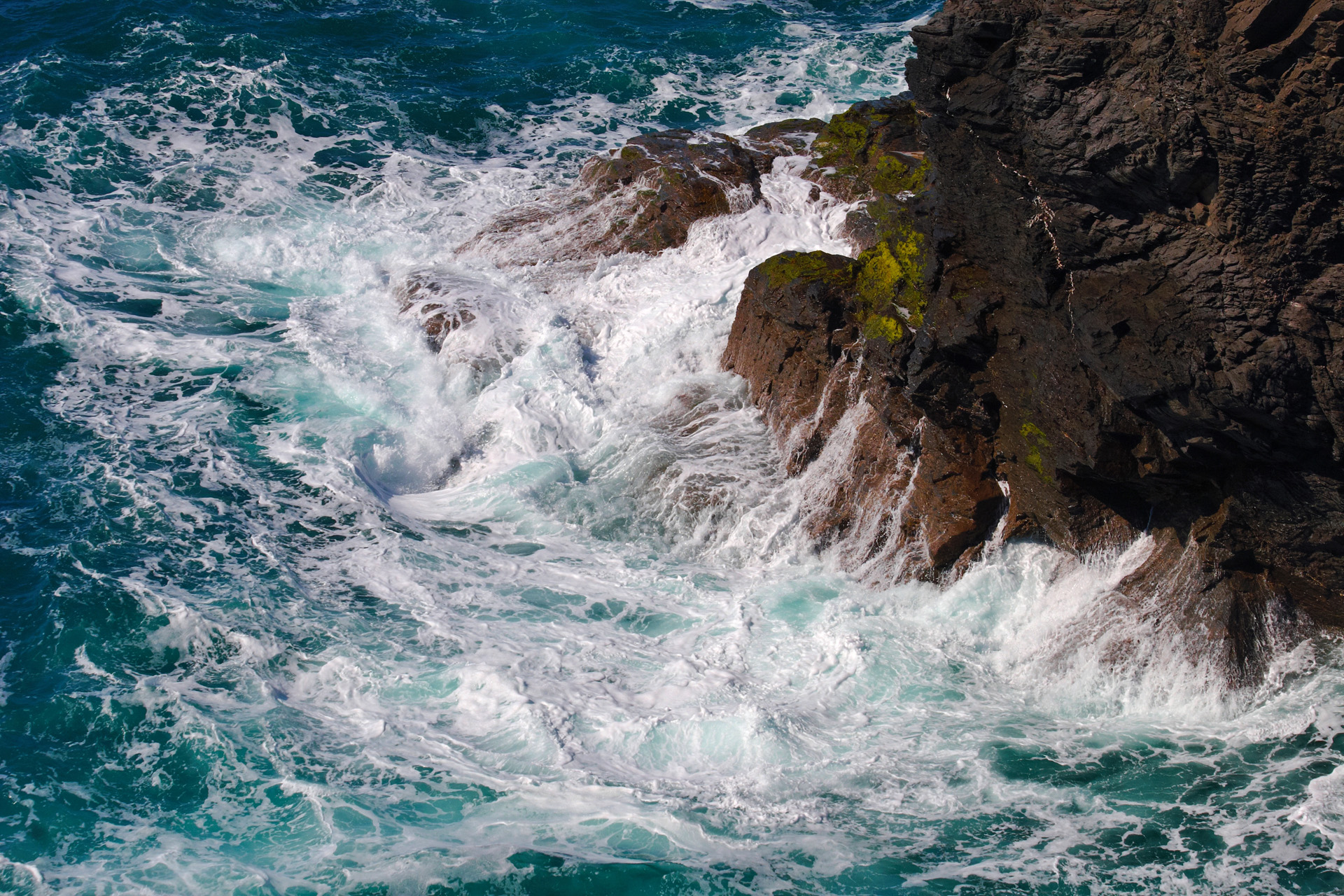 Waves breaking on the rocks at High Cove, Cornwall