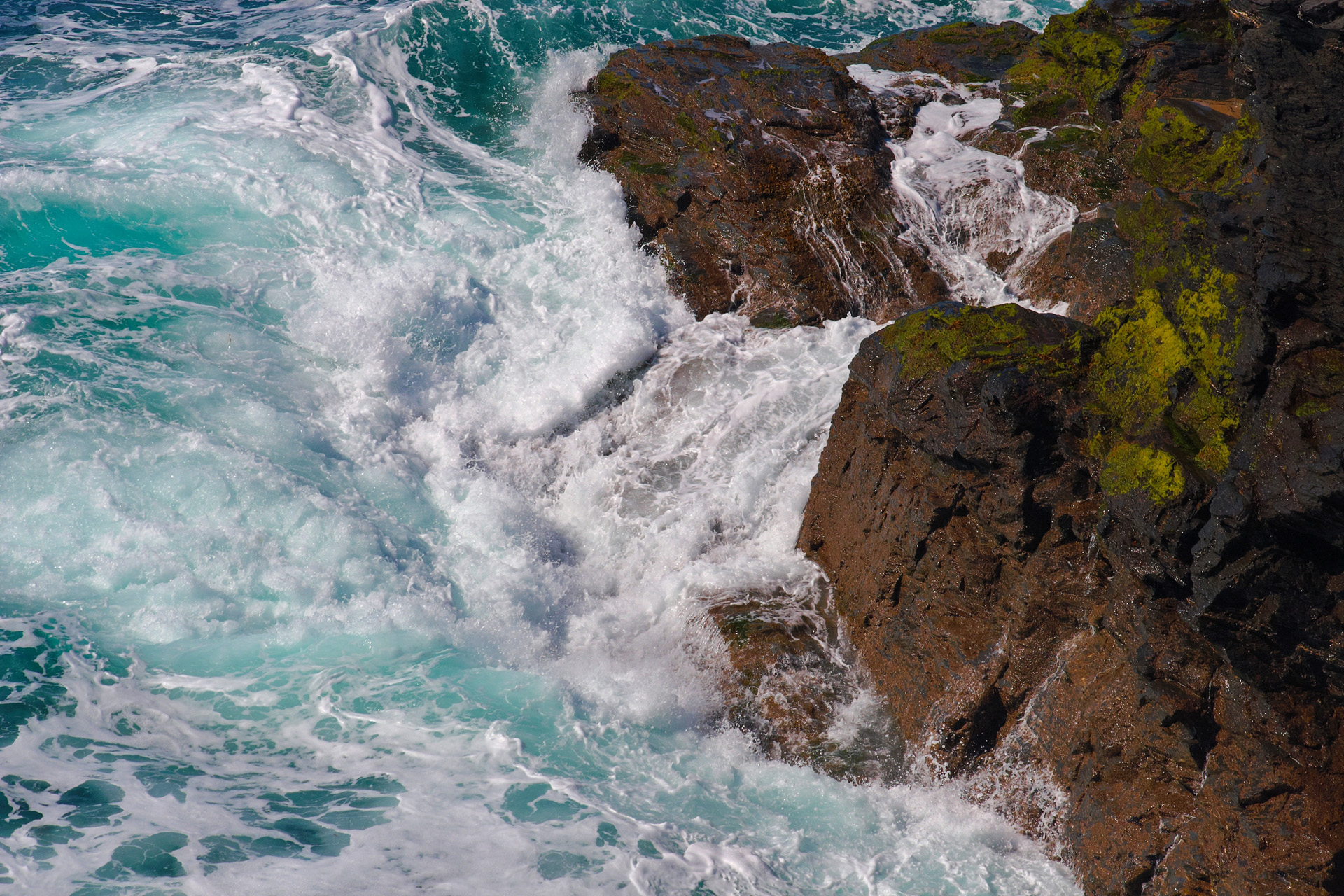 Waves breaking on the rocks at High Cove, Cornwall