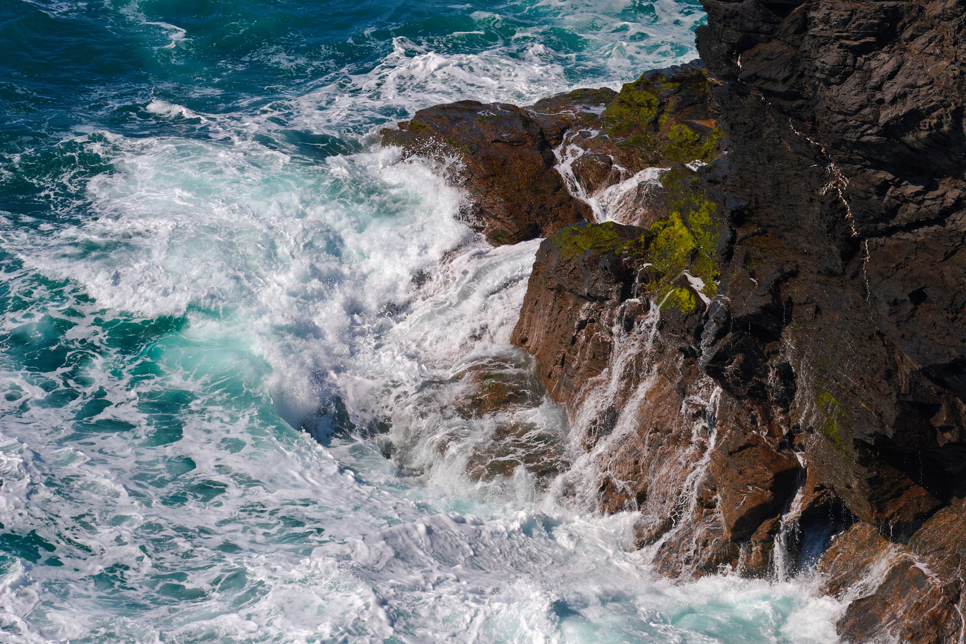Waves breaking on the rocks at High Cove, Cornwall