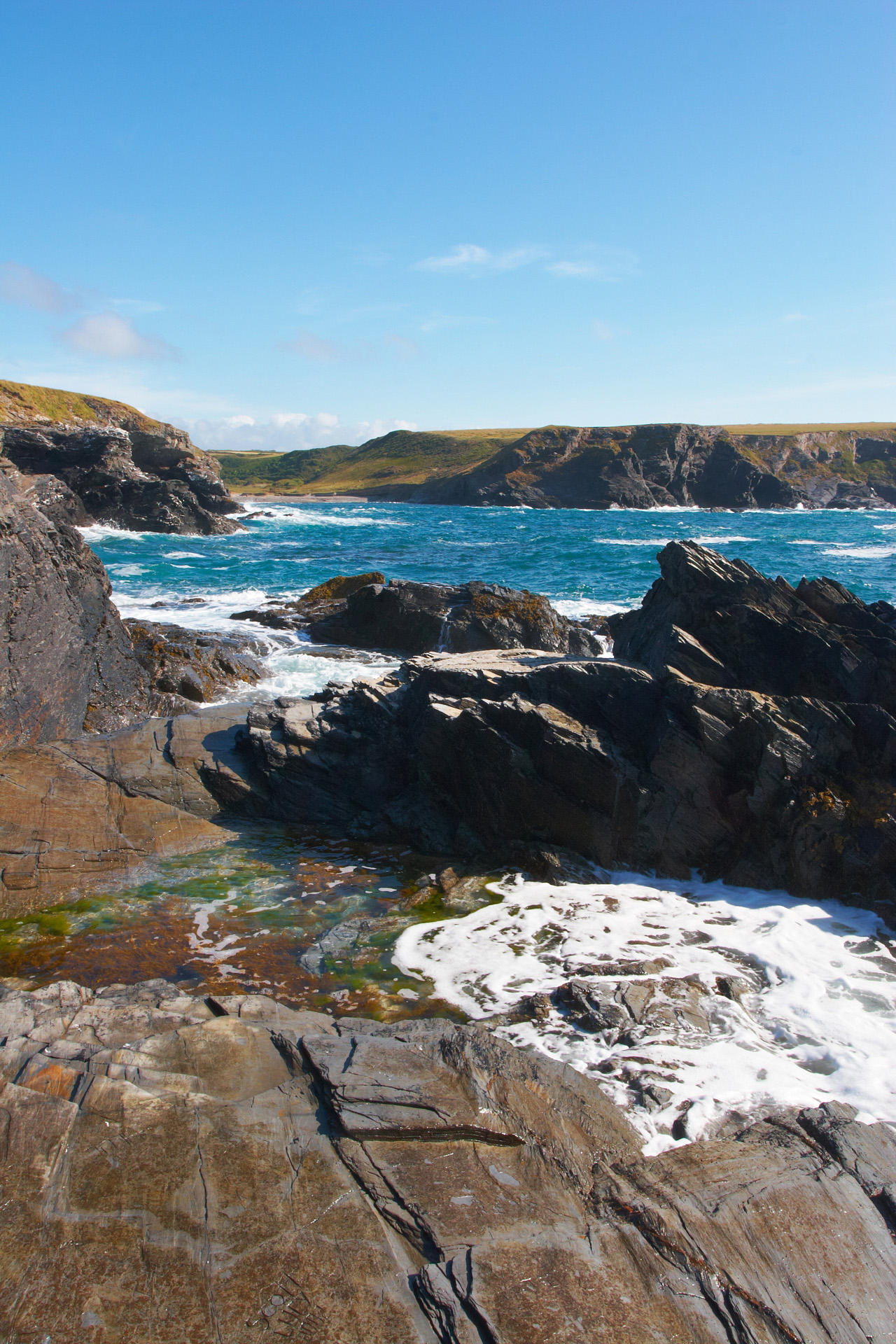 Waves breaking on the rocks at Will's Rock near Portcothan on th