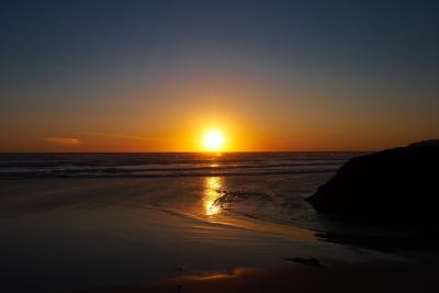 Sunset on the beach at Bedruthan Steps in Cornwall