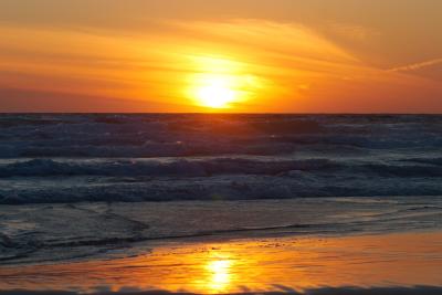 Sunset on the beach at Bedruthan Steps in Cornwall