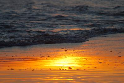 Sunset on the beach at Bedruthan Steps in Cornwall