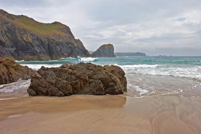 Kynance Cove surfer